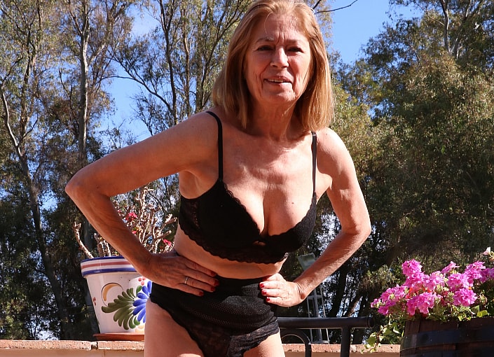Exhibitionist GILF Marta Bares it All on the Rooftop